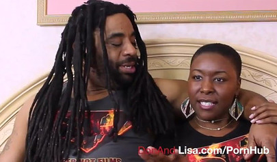 Curvy ebony girl with short hair sucks a stiff black rod before riding it deep