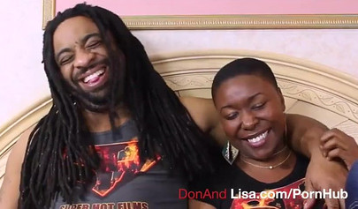 Curvy ebony girl with short hair sucks a stiff black rod before riding it deep