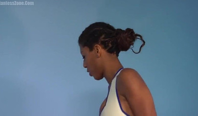 Super hot and sexy ebony giantess walks around a small city showing her attributes