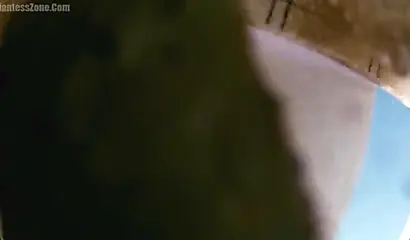 Super hot and sexy ebony giantess walks around a small city showing her attributes