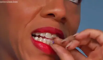 Super hot and sexy ebony giantess walks around a small city showing her attributes