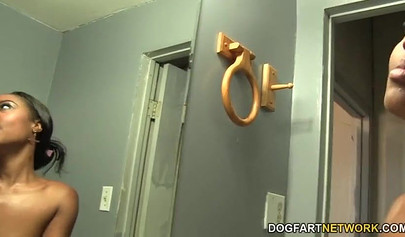 Young black chick Chanell Heart slobbers on and fucks a big dick in a gloryhole