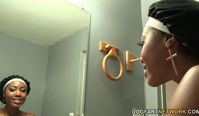 Young black chick Chanell Heart slobbers on and fucks a big dick in a gloryhole