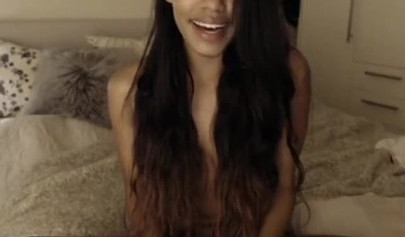 Stunning mix of ebony and Asian spreads her legs and masturbates for the webcam