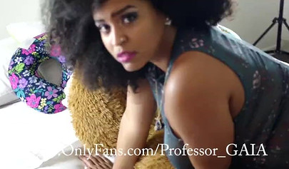 Black Latina shows her big boobs as she plays with her plush toy, sucking him