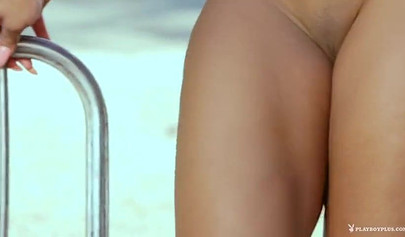 Black girl drops her lingerie to reveal a perfect pair of tits and shaved pussy