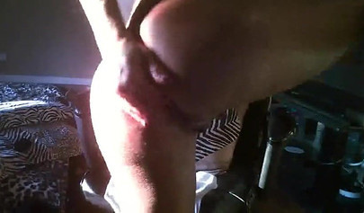 Horny black amateur strips for the webcam and fucks her tight ass with a dildo