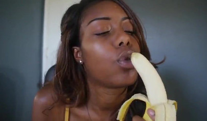 ASMR video of a beautiful black babe teasing you by sensually sucking on a banana