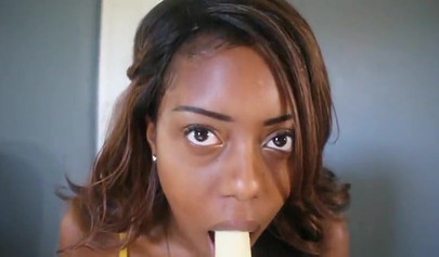 ASMR video of a beautiful black babe teasing you by sensually sucking on a banana