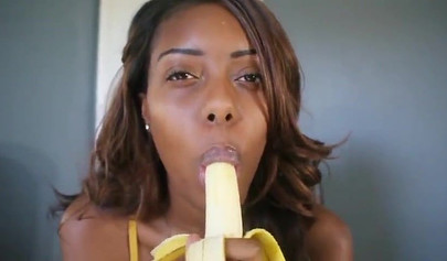 ASMR video of a beautiful black babe teasing you by sensually sucking on a banana