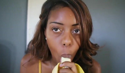 ASMR video of a beautiful black babe teasing you by sensually sucking on a banana