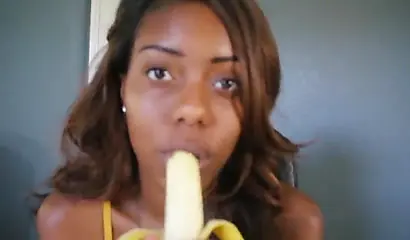 ASMR video of a beautiful black babe teasing you by sensually sucking on a banana