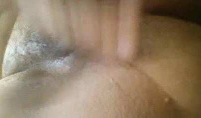 Kinky black amateur babe strips at works before fingering her tight wet pussy