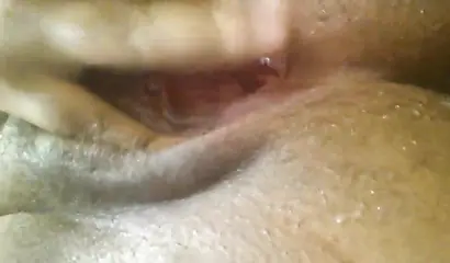 Kinky black amateur babe strips at works before fingering her tight wet pussy