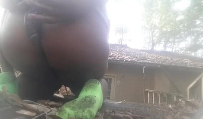 Chubby black amateur shows off her big tits and ass and rides a dildo outside