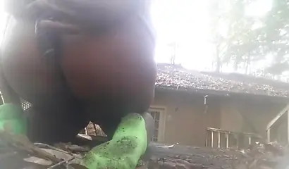 Chubby black amateur shows off her big tits and ass and rides a dildo outside