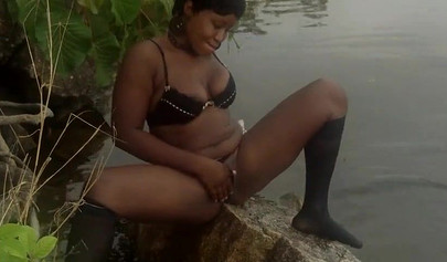 Amateur black girl strips naked and rubs her pussy outside before fucking her man