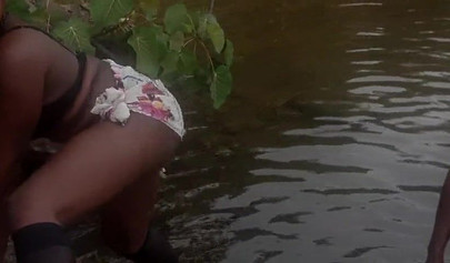 Amateur black girl strips naked and rubs her pussy outside before fucking her man