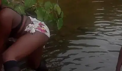 Amateur black girl strips naked and rubs her pussy outside before fucking her man