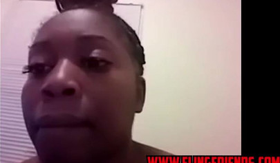 Horny and chubby black amateur babe loves showing her massive tits on a webcam