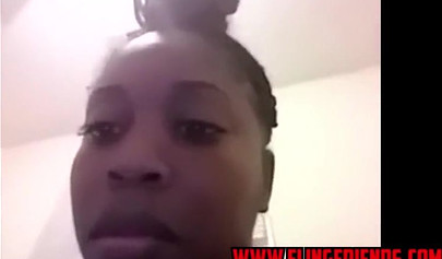 Horny and chubby black amateur babe loves showing her massive tits on a webcam