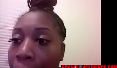 Horny and chubby black amateur babe loves showing her massive tits on a webcam