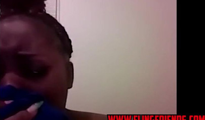 Horny and chubby black amateur babe loves showing her massive tits on a webcam