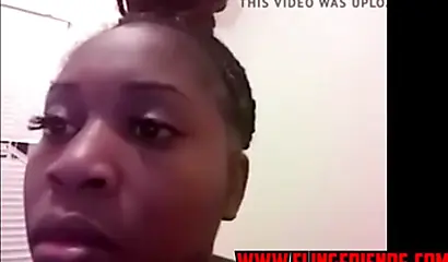 Horny and chubby black amateur babe loves showing her massive tits on a webcam