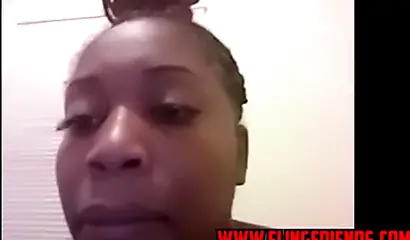 Horny and chubby black amateur babe loves showing her massive tits on a webcam