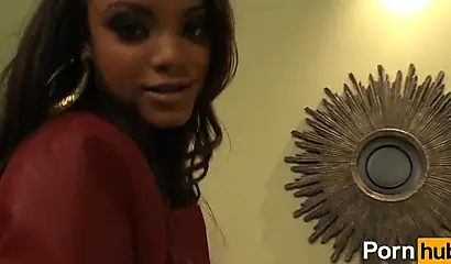 Stunning black babe slobbers on a big white cock before riding it deep and rough