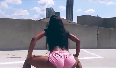 Lasses with big ebony asses show off those amazing cheeks for their audience