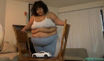 Brunette with amazing big titties shows off that impeccable ebony body for us