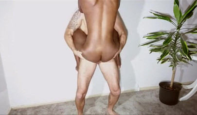 Ebony babe is picked up and her pussy is fucked until she takes a big cumshot