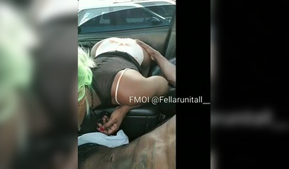 Black cutie gives dude an amazing blowjob in the parking lot and moans as well