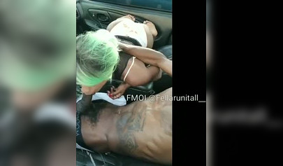 Black cutie gives dude an amazing blowjob in the parking lot and moans as well