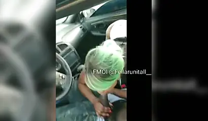 Black cutie gives dude an amazing blowjob in the parking lot and moans as well