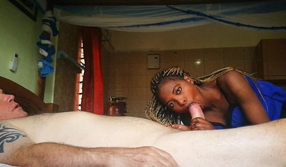 Black teenie massages her client and then takes his cock inside of her wet hole