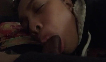 Short-haired ebony teen cutie gets her mouth filled with a thick brown meat rod