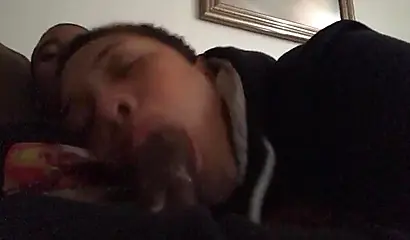 Short-haired ebony teen cutie gets her mouth filled with a thick brown meat rod