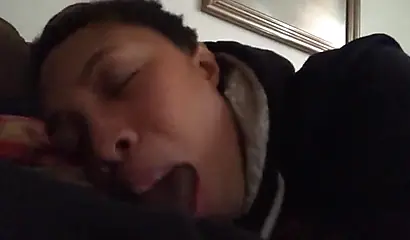 Short-haired ebony teen cutie gets her mouth filled with a thick brown meat rod