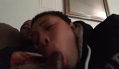 Short-haired ebony teen cutie gets her mouth filled with a thick brown meat rod