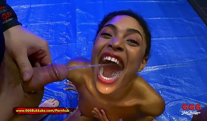 Ebony Luna Corazon sucks dicks and earns a sexy reward made of piss and cum