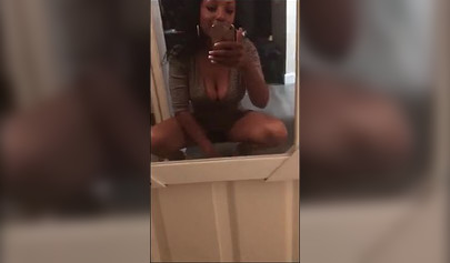 Ebony records an amateur video where she takes her clothes and shows her body