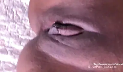 Two amateur ebony ladies relax and have hot and steamy lesbian sex on a huge bed