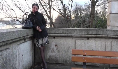 Ebony chick sucks a dick in public and then gets fucked by two guys in a room