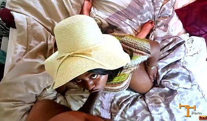 Sweet ebony chick sucks a big fat dick and gets her thick ass fucked real hard