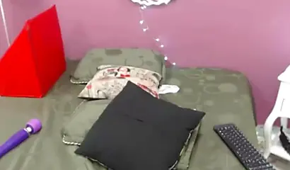 Ebony slut with gigantic tits uses a vibrator to stimulate her pussy and cums