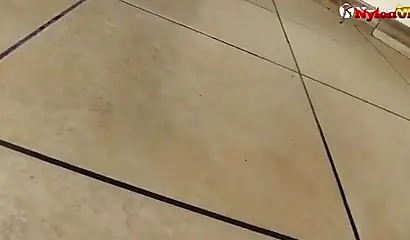 Stunning ebony slut is displaying her sexy feet and is fingering her tight pussy