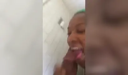 Amateur black lady with large tits gives a sloppy facial and makes her man cum