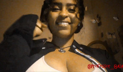 Horny black babe Gaia Monroe strips naked and seduces live cams with her big tits